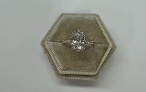 Diamond engagement ring in velvet hexagon box
