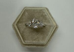 Pear-shaped diamond ring in hexagon velvet box