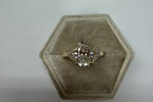 Halo diamond engagement ring in velvet box